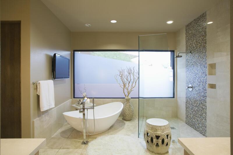 bathroom with white tub